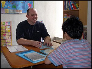 Teaching English to a secondary school student at my home.